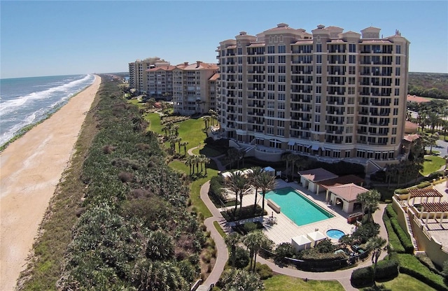 20 Porto Mar Unit 302, Palm Coast, FL 32137 - bird's eye view of apartment complex / building and waterfront with a beach