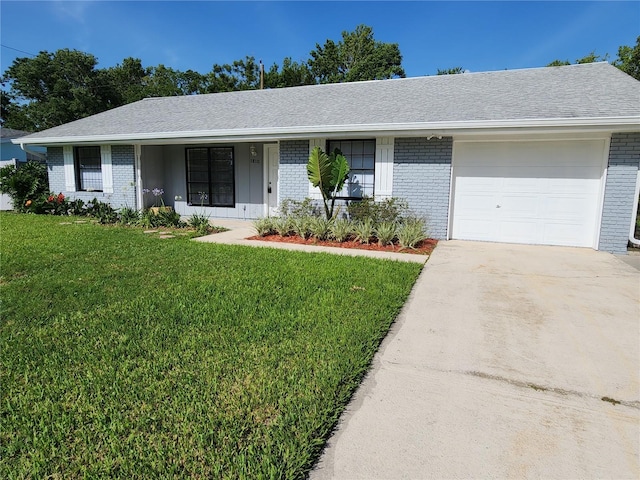 1810 Western Rd, South Daytona, FL 32119 - ranch-style house with brick siding, a garage, a front yard, driveway, and roof with shingles