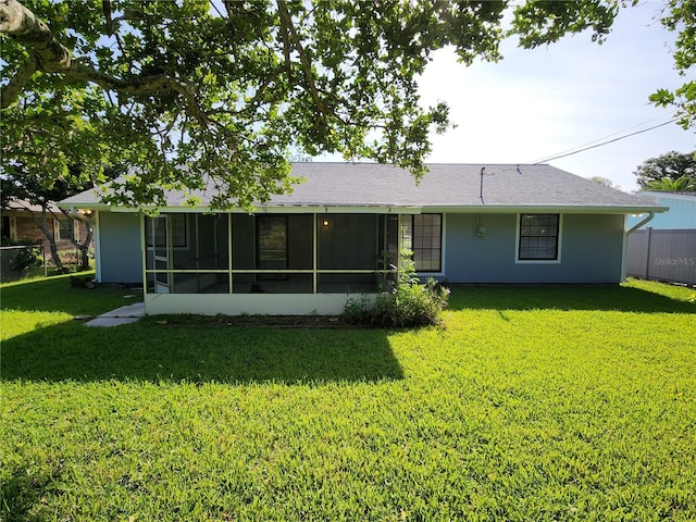 1810 Western Rd, South Daytona, FL 32119 - rear view of house with a sunroom