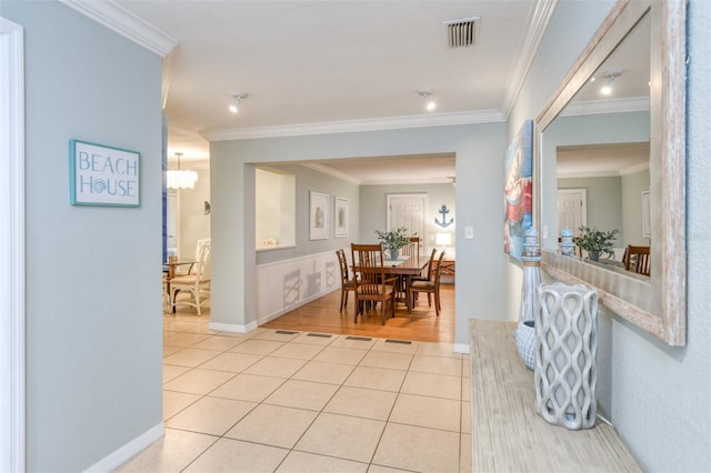 159 Southwind Cir, Saint Augustine, FL 32080 - dining area with light tile patterned flooring and ornamental molding