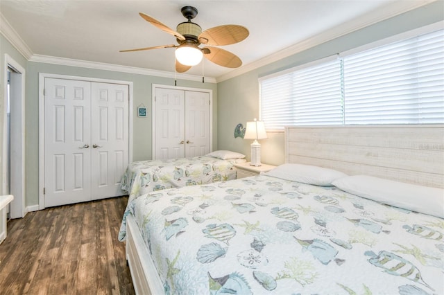 159 Southwind Cir, Saint Augustine, FL 32080 - bedroom featuring two closets, dark wood finished floors, crown molding, and a ceiling fan
