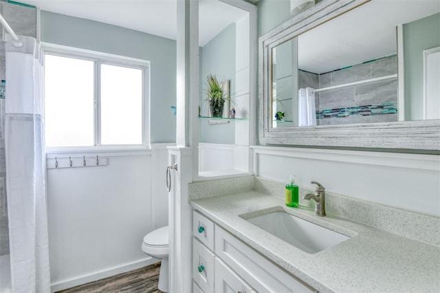 159 Southwind Cir, Saint Augustine, FL 32080 - full bath featuring vanity, curtained shower, and wood finished floors