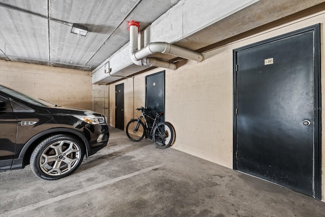 100 Bella Harbor Ct Unit 103, Palm Coast, FL 32137 - garage featuring concrete block wall