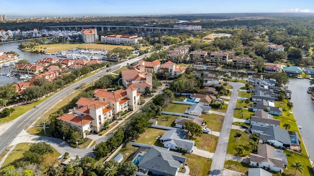 100 Bella Harbor Ct Unit 103, Palm Coast, FL 32137 - aerial overview of property's location featuring a nearby body of water and nearby suburban area