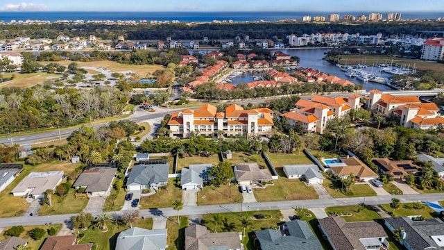 100 Bella Harbor Ct Unit 103, Palm Coast, FL 32137 - aerial view of property and surrounding area with a large body of water and nearby suburban area