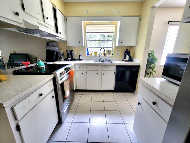 1561 Copperfield Ave, Deltona, FL 32738 - kitchen featuring dishwasher, electric range oven, stainless steel microwave, light countertops, and under cabinet range hood