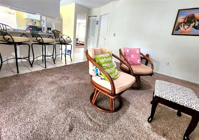 1561 Copperfield Ave, Deltona, FL 32738 - carpeted living area featuring tile patterned floors and baseboards