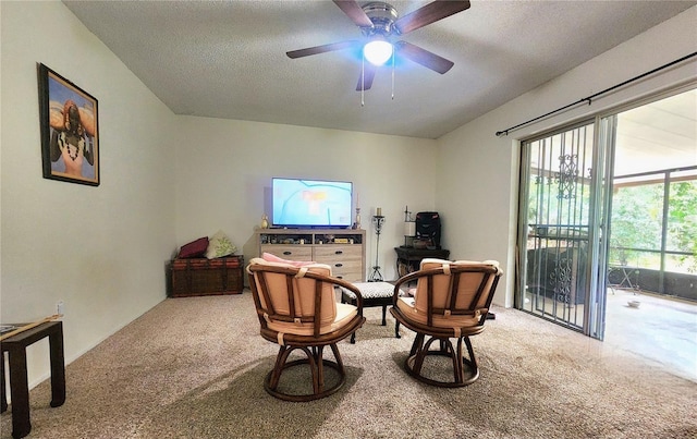 1561 Copperfield Ave, Deltona, FL 32738 - living area with carpet floors, a textured ceiling, and a ceiling fan