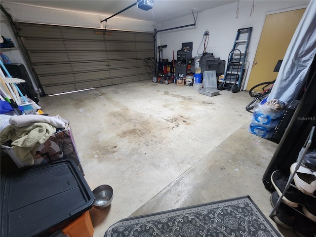 1561 Copperfield Ave, Deltona, FL 32738 - garage featuring a garage door opener