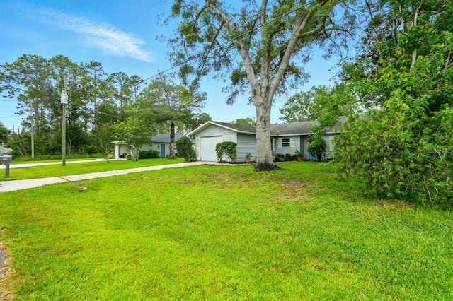 29 Rylin Ln, Palm Coast, FL 32164 - view of front of home with concrete driveway, a front lawn, and an attached garage