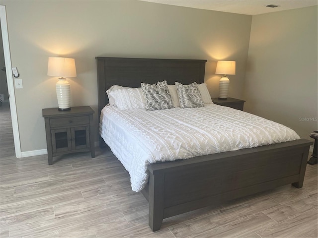 2 Unity Ct, Palm Coast, FL 32164 - bedroom featuring wood finished floors
