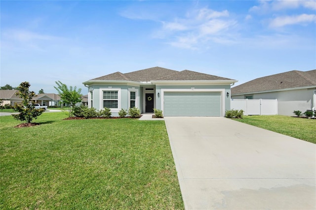 51 Oakleaf Way, Palm Coast, FL 32137 - ranch-style house with a garage, driveway, and stucco siding