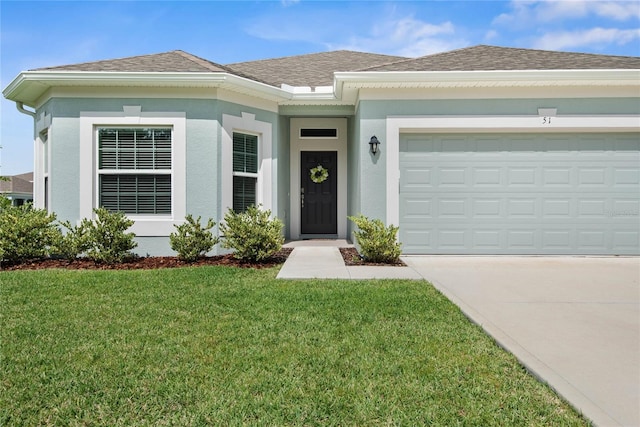 51 Oakleaf Way, Palm Coast, FL 32137 - single story home with driveway, a front yard, an attached garage, stucco siding, and roof with shingles