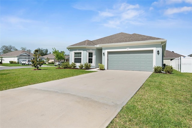 51 Oakleaf Way, Palm Coast, FL 32137 - single story home with concrete driveway, a garage, stucco siding, and roof with shingles