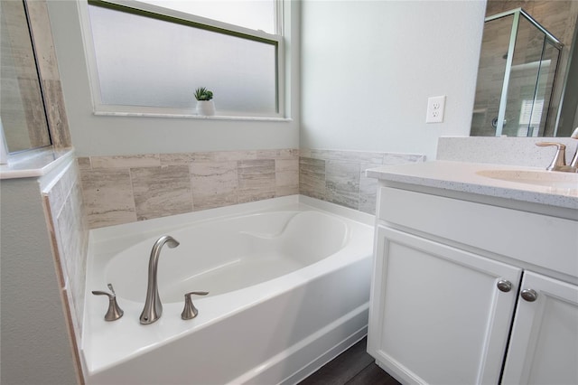 51 Oakleaf Way, Palm Coast, FL 32137 - full bathroom with vanity, a bath, and a shower with shower door