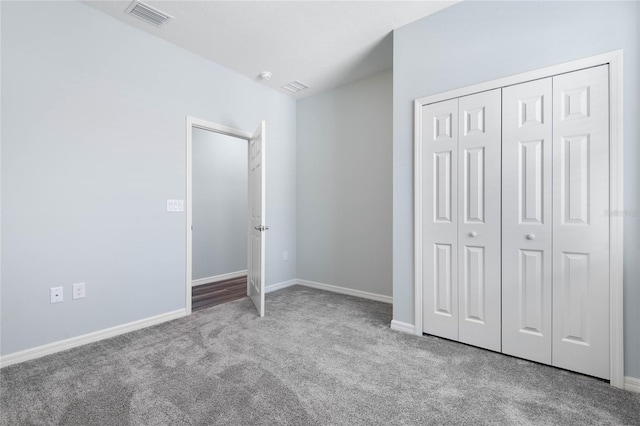 51 Oakleaf Way, Palm Coast, FL 32137 - unfurnished bedroom featuring carpet floors and a closet