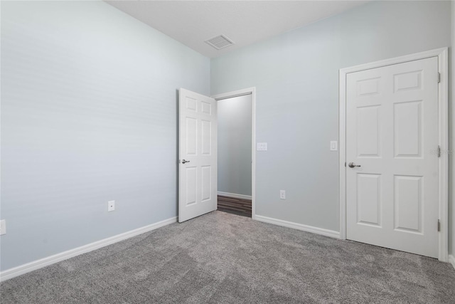 51 Oakleaf Way, Palm Coast, FL 32137 - unfurnished bedroom featuring carpet and baseboards