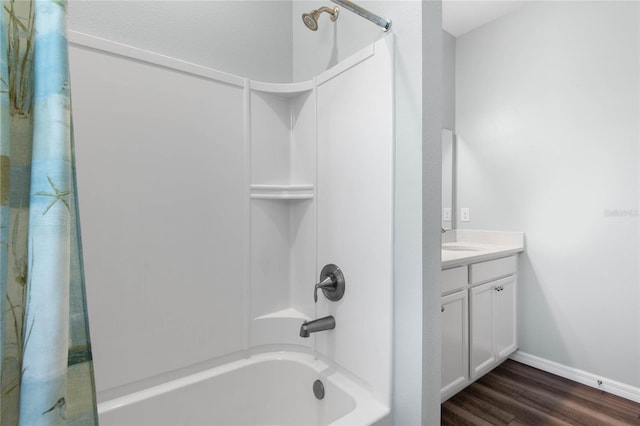 51 Oakleaf Way, Palm Coast, FL 32137 - bathroom featuring shower / bathtub combination with curtain, vanity, and wood finished floors