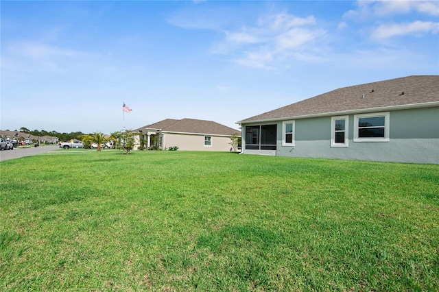 51 Oakleaf Way, Palm Coast, FL 32137 - view of grassy yard with a sunroom