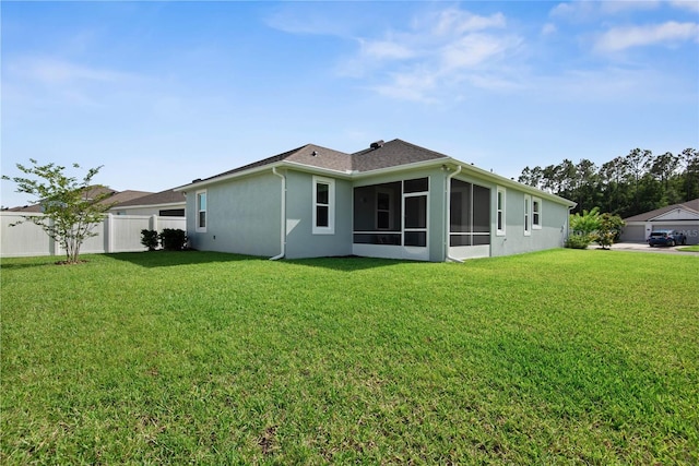 51 Oakleaf Way, Palm Coast, FL 32137 - back of house featuring a sunroom and stucco siding