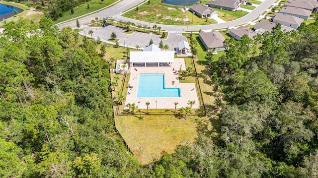 51 Oakleaf Way, Palm Coast, FL 32137 - aerial perspective of suburban area featuring a pool and a large body of water