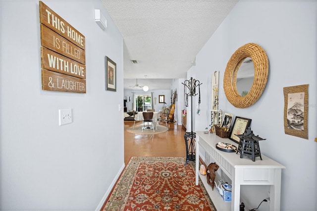 152 Fenimore Ln Unit A & B, Palm Coast, FL 32137 - hallway featuring a textured ceiling and wood finished floors