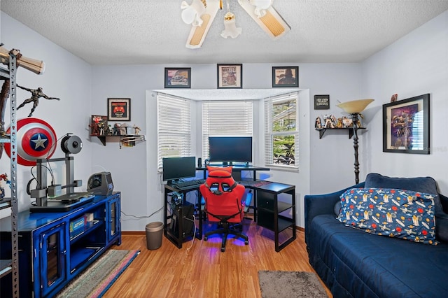 152 Fenimore Ln Unit A & B, Palm Coast, FL 32137 - office area with wood finished floors, a textured ceiling, and ceiling fan