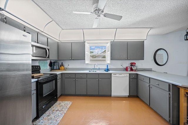 152 Fenimore Ln Unit A & B, Palm Coast, FL 32137 - kitchen featuring stainless steel appliances, gray cabinetry, a textured ceiling, a ceiling fan, and light countertops