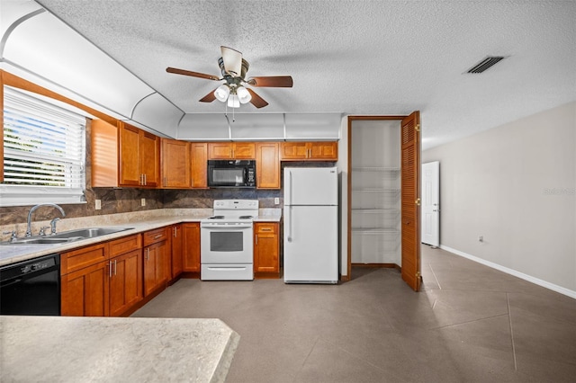 152 Fenimore Ln Unit A & B, Palm Coast, FL 32137 - kitchen with black appliances, ceiling fan, a textured ceiling, brown cabinetry, and light countertops