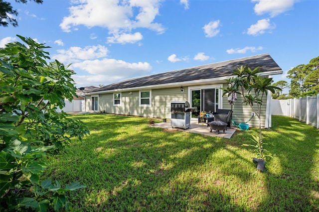 152 Fenimore Ln Unit A & B, Palm Coast, FL 32137 - rear view of house featuring a fenced backyard and a patio area