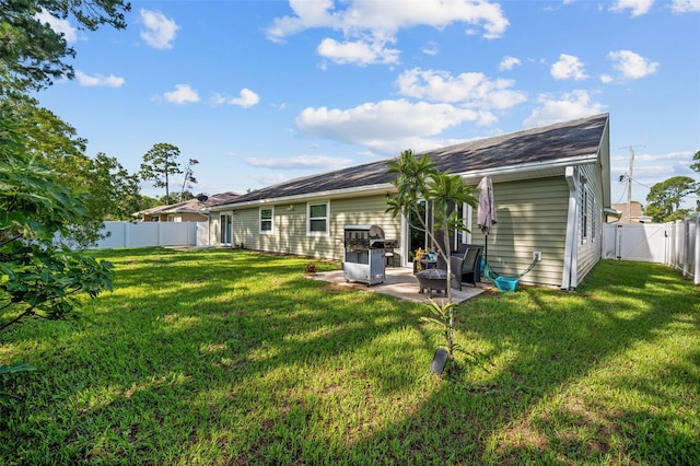 152 Fenimore Ln Unit A & B, Palm Coast, FL 32137 - back of property with a patio and a fenced backyard