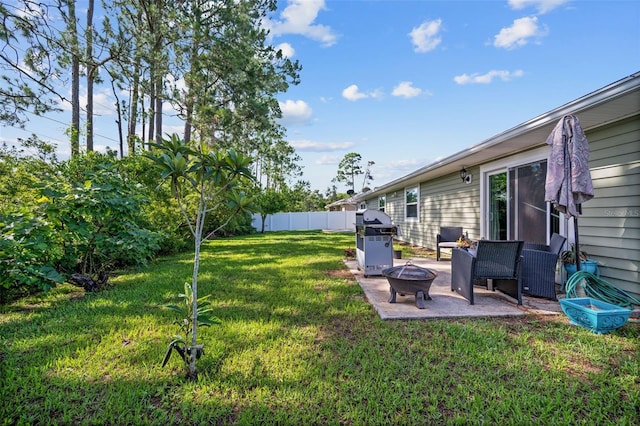 152 Fenimore Ln Unit A & B, Palm Coast, FL 32137 - fenced yard featuring a patio and a fire pit