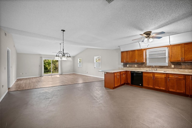 152 Fenimore Ln Unit A & B, Palm Coast, FL 32137 - kitchen with dishwasher, open floor plan, a peninsula, brown cabinets, and light countertops
