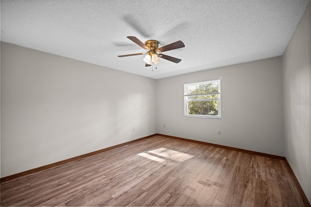 152 Fenimore Ln Unit A & B, Palm Coast, FL 32137 - empty room featuring wood finished floors, a ceiling fan, and a textured ceiling