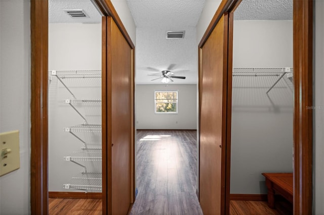 152 Fenimore Ln Unit A & B, Palm Coast, FL 32137 - corridor with a textured ceiling and wood finished floors