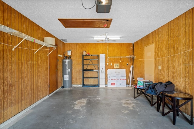 152 Fenimore Ln Unit A & B, Palm Coast, FL 32137 - garage with electric water heater, wooden walls, and a garage door opener