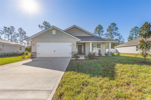 6 Bainbridge Ln, Palm Coast, FL 32137 - view of front of property featuring a garage, a front yard, concrete driveway, and brick siding