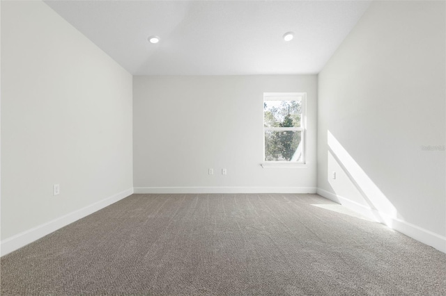 6 Bainbridge Ln, Palm Coast, FL 32137 - carpeted spare room with baseboards and recessed lighting