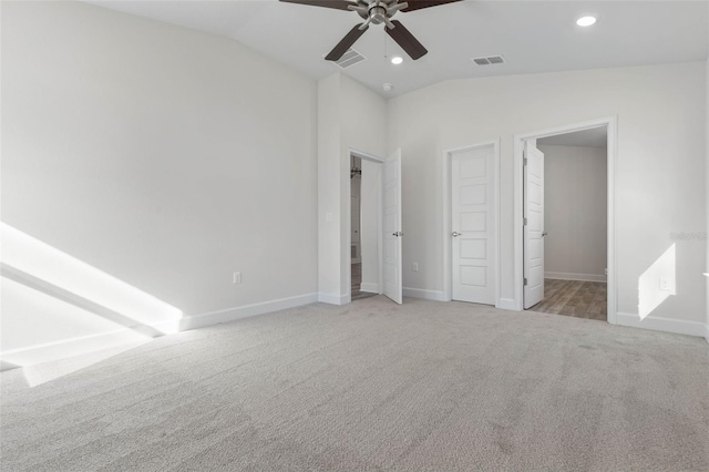 6 Bainbridge Ln, Palm Coast, FL 32137 - unfurnished bedroom with light carpet, lofted ceiling, recessed lighting, and ceiling fan