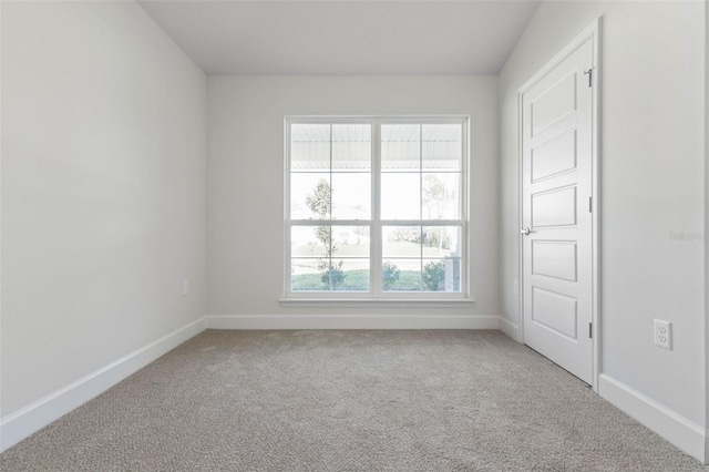 6 Bainbridge Ln, Palm Coast, FL 32137 - empty room with carpet floors and baseboards