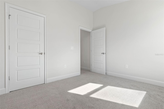 6 Bainbridge Ln, Palm Coast, FL 32137 - unfurnished bedroom with carpet floors and baseboards