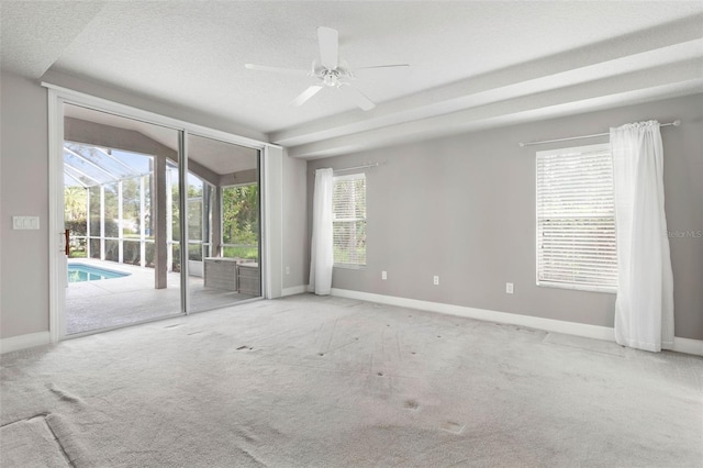 81 Brownstone Ln, Palm Coast, FL 32137 - carpeted empty room with ceiling fan and a textured ceiling