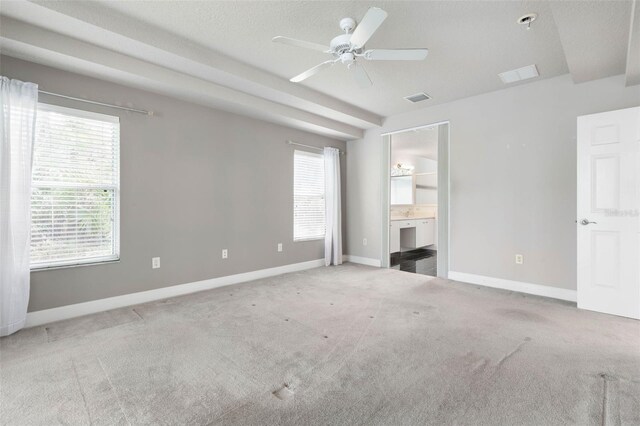 81 Brownstone Ln, Palm Coast, FL 32137 - unfurnished bedroom featuring carpet, ensuite bathroom, and a ceiling fan