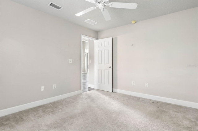 81 Brownstone Ln, Palm Coast, FL 32137 - spare room featuring ceiling fan, carpet floors, and a smoke detector