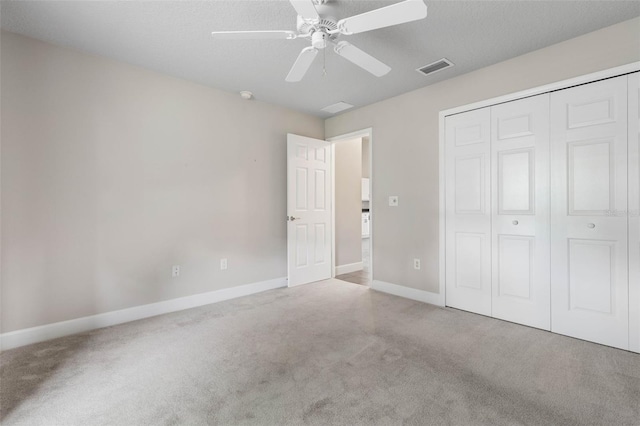 81 Brownstone Ln, Palm Coast, FL 32137 - unfurnished bedroom featuring carpet, a closet, and a ceiling fan