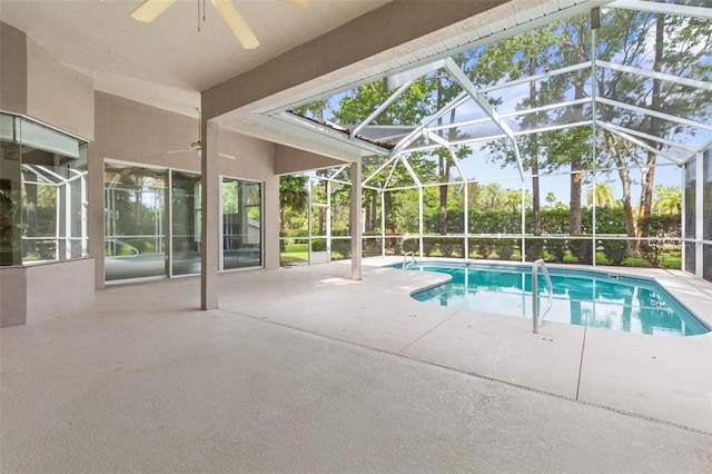 81 Brownstone Ln, Palm Coast, FL 32137 - outdoor pool with ceiling fan, a patio area, and glass enclosure