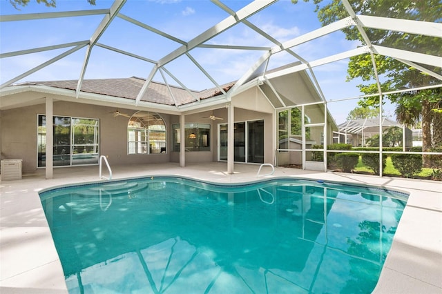 81 Brownstone Ln, Palm Coast, FL 32137 - outdoor pool featuring ceiling fan, a patio area, and a lanai