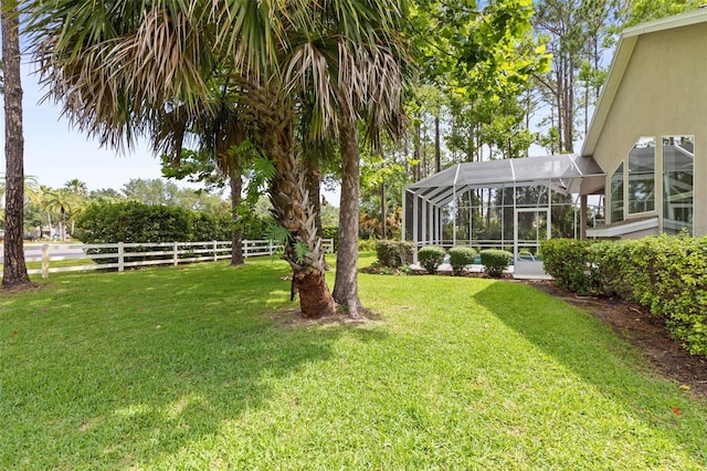 81 Brownstone Ln, Palm Coast, FL 32137 - view of yard featuring glass enclosure