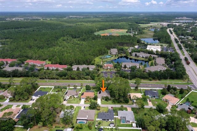 81 Brownstone Ln, Palm Coast, FL 32137 - aerial overview of property's location featuring a large body of water and nearby suburban area