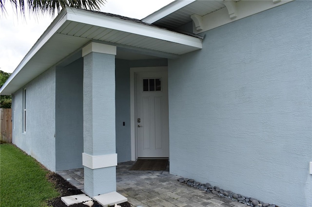 146 Via Madrid Dr, Ormond Beach, FL 32176 - view of exterior entry with stucco siding